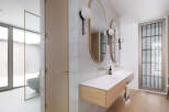 This stunning bathroom boasts a modern design with sleek, minimalist features.