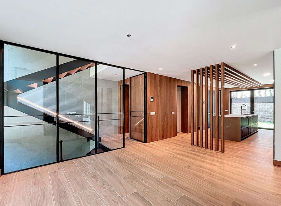 This property boasts an open-concept design with striking architectural elements.