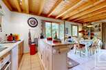 Discover this charming property featuring a spacious kitchen with a central island, perfect for culinary enthusiasts.