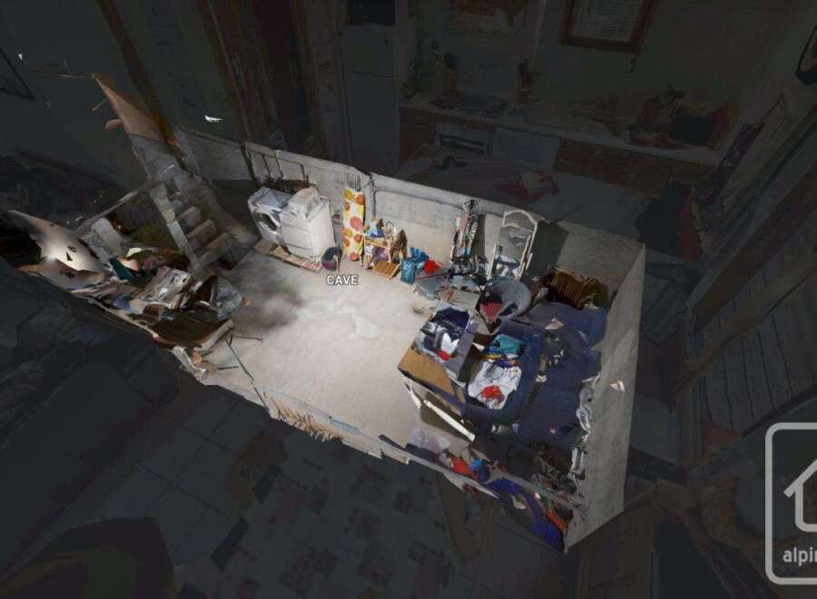 Explore this unique property featuring a spacious cave, ideal for storage or creative space.