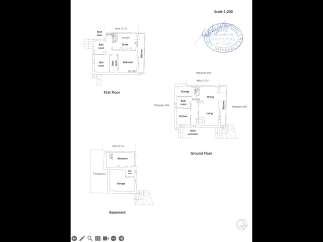 This is a blueprint of a house showcasing the basement, ground floor, and first floor layouts.