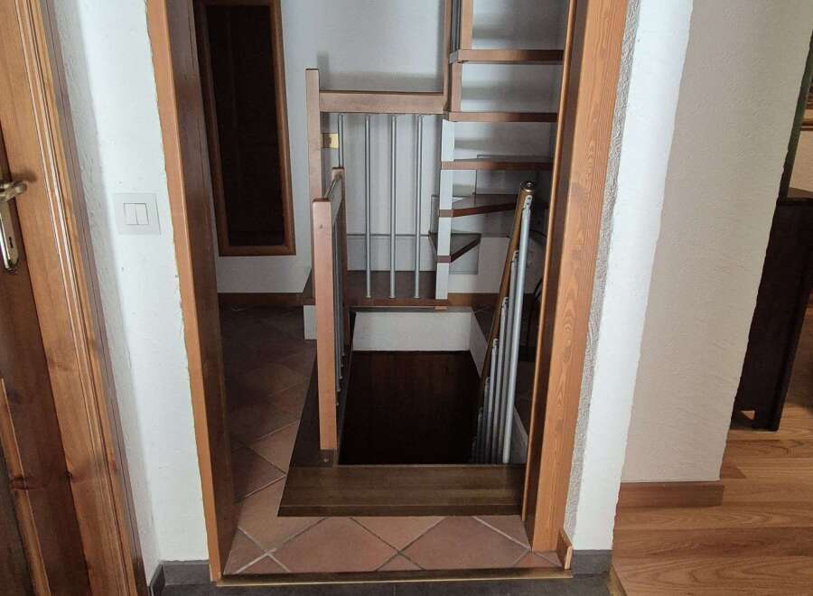 Step into a world of architectural detail with this inviting entryway.