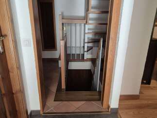 Step into a world of architectural detail with this inviting entryway.