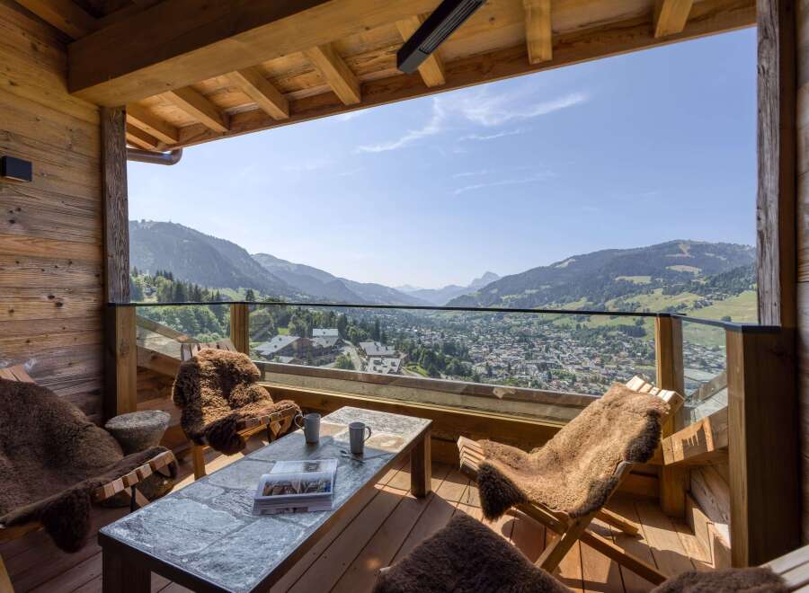 Experience luxury living with this stunning property featuring a spacious balcony and breathtaking mountain views.