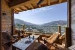 Experience luxury living with this stunning property featuring a spacious balcony and breathtaking mountain views.