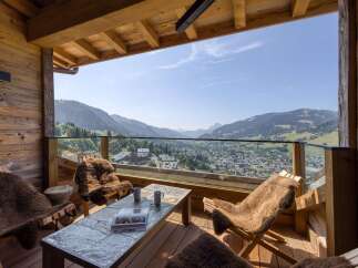 Experience luxury living with this stunning property featuring a spacious balcony and breathtaking mountain views.