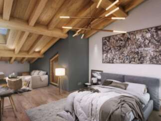 Discover a luxurious attic bedroom in this stunning property.