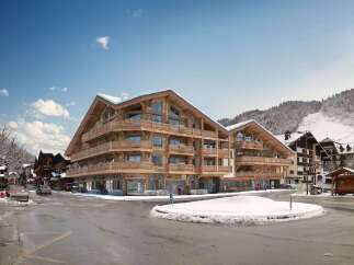 Discover luxury living in this stunning wooden chalet-style apartment building, perfectly situated in a picturesque snowy mountain town.