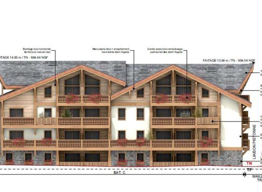 This property boasts horizontal wood cladding with a light natural finish, complemented by custom wood trim.