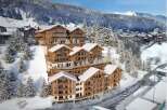 Discover luxury living in these stunning ski chalets nestled in a picturesque snowy landscape.