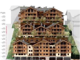 This is an image of a multi-level chalet-style apartment building.