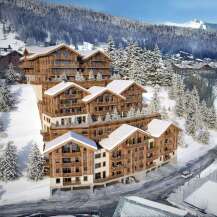 Discover luxury living in these stunning ski chalets nestled in a picturesque snowy landscape.
