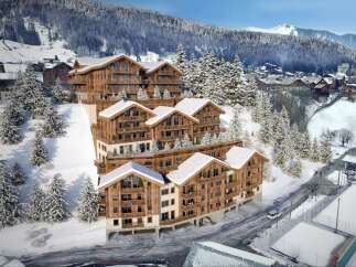 Discover luxury living in these stunning ski chalets nestled in a picturesque snowy landscape.