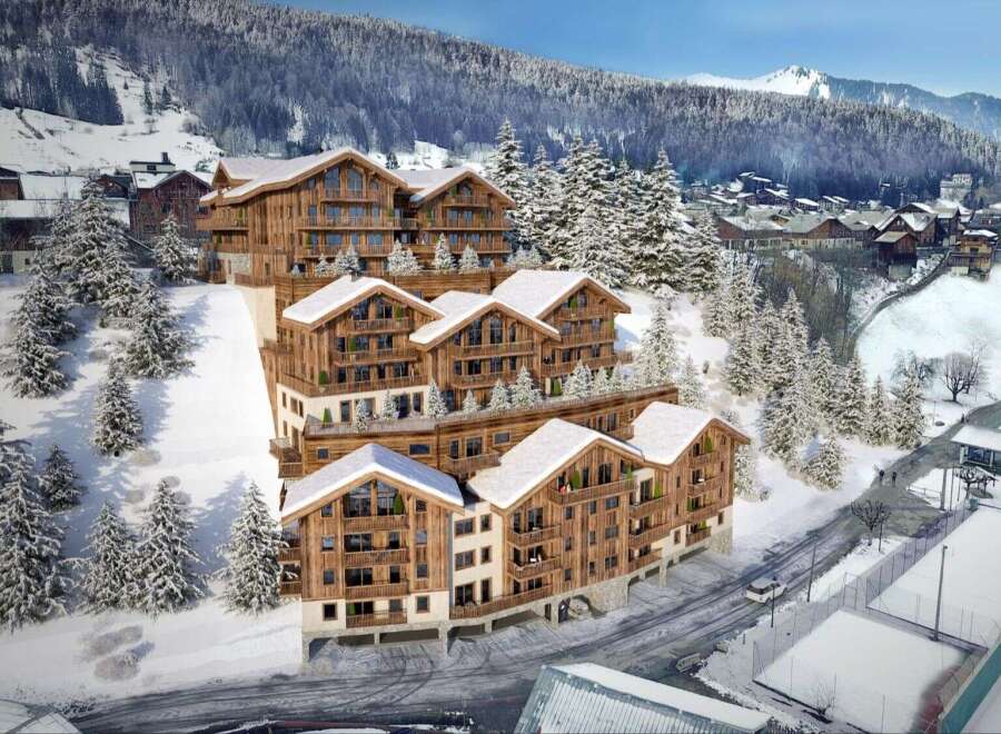 Discover luxury living in these stunning ski chalets nestled in a picturesque snowy landscape.