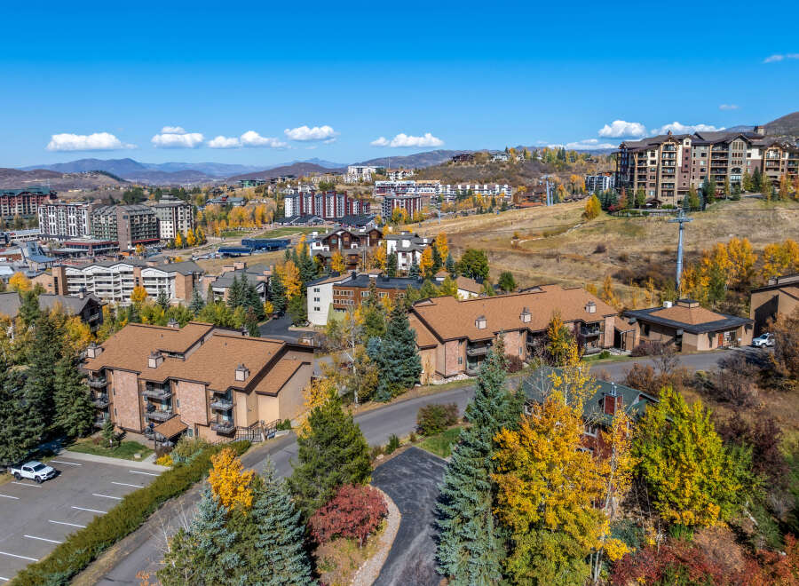 Luxury real estate in a mountain resort town boasts stunning views and autumn foliage.