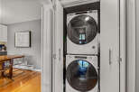 This property features a convenient laundry closet with a stacked washer and dryer, maximizing space in your home.