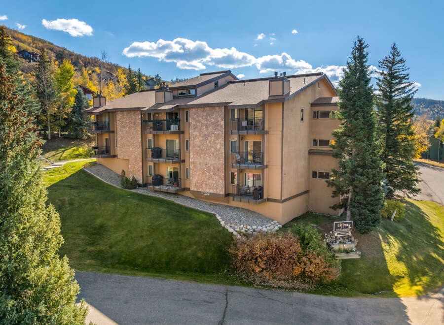 Discover your mountain retreat at Ski Inn Condominiums, offering cozy condos with private balconies to soak in the scenic views.