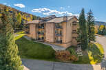 Discover your mountain retreat at Ski Inn Condominiums, offering cozy condos with private balconies to soak in the scenic views.