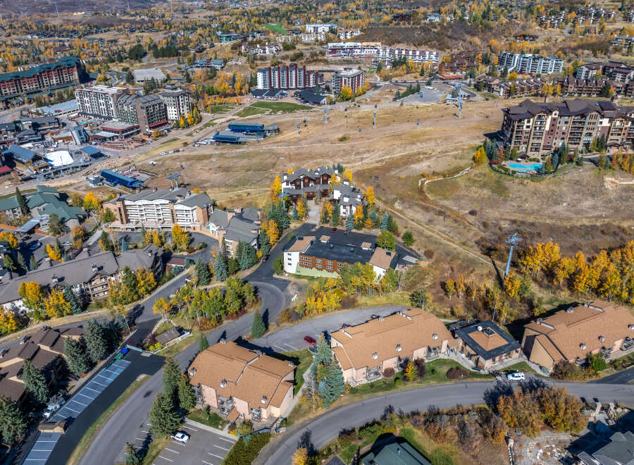 Luxury real estate nestled in the heart of a vibrant ski resort town, offering a mix of condominium and private residence options.