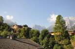 Discover mountain properties with breathtaking views! This charming home offers a serene escape surrounded by lush greenery and majestic mountains.