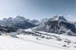 Discover the charm of mountain living with this stunning property nestled in a snow-covered valley.