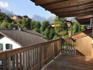 Enjoy breathtaking mountain views from this charming property.