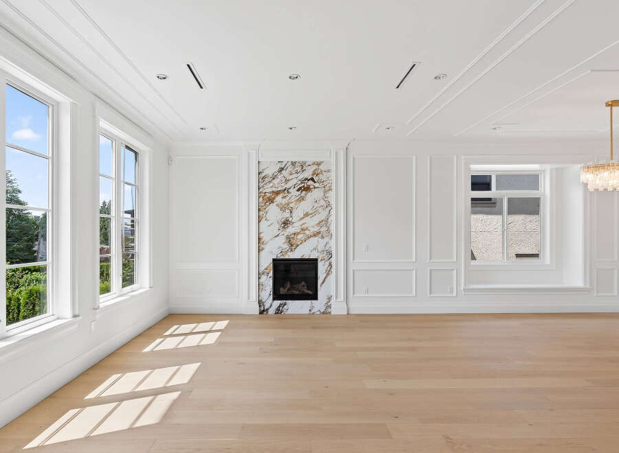 This stunning property boasts a bright and airy living space, accentuated by large windows and gleaming hardwood floors.