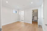This bright and airy bedroom offers a clean, modern aesthetic perfect for relaxation.