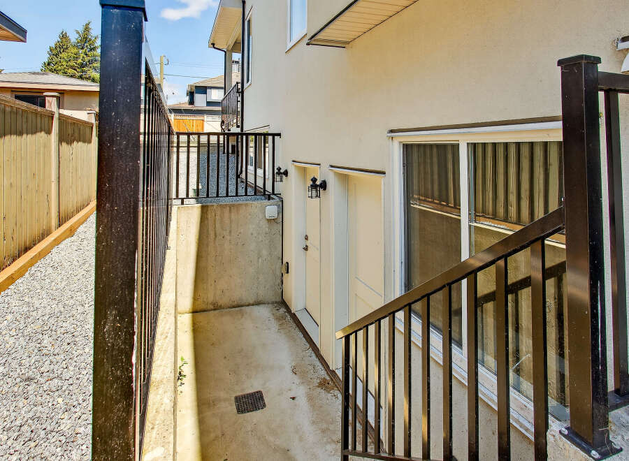This property features a private entrance and a basement window, offering natural light and ventilation.