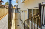 This property features a private entrance and a basement window, offering natural light and ventilation.