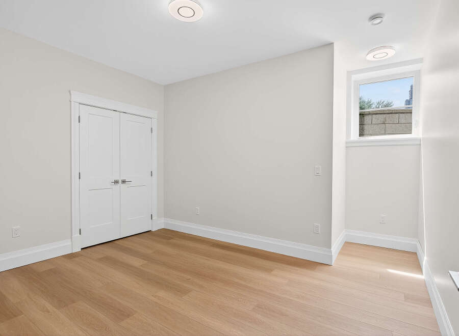 This is a bright, freshly painted room that's move-in ready.