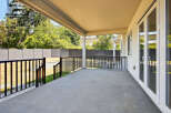 This expansive patio offers a seamless transition from indoor to outdoor living.