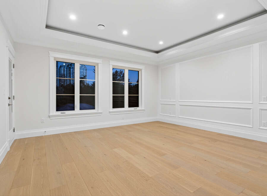This is an empty living room, perfect for staging and showcasing its potential.