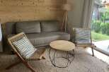 This cozy living room features a comfortable sofa, perfect for relaxing after a long day.