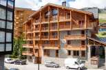 Discover a luxurious mountain retreat in this stunning chalet-style property.