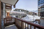 Overlooking a snowy landscape, this property boasts stunning mountain views.