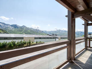 Enjoy breathtaking mountain views from the balcony of this property.