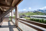 Enjoy breathtaking mountain views from this charming balcony.