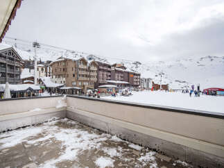 Enjoy breathtaking views of the snow-covered Alps from the balcony of this ski-in/ski-out property.