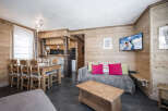 Experience cozy mountain living in this charming chalet-style apartment.