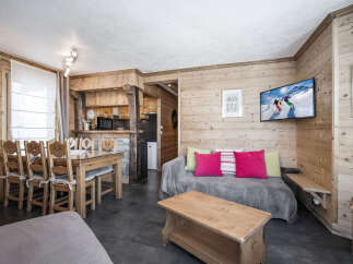 Experience cozy mountain living in this charming chalet-style apartment.