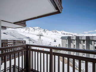 Enjoy breathtaking mountain views from the private balcony of this ski-in/ski-out property.