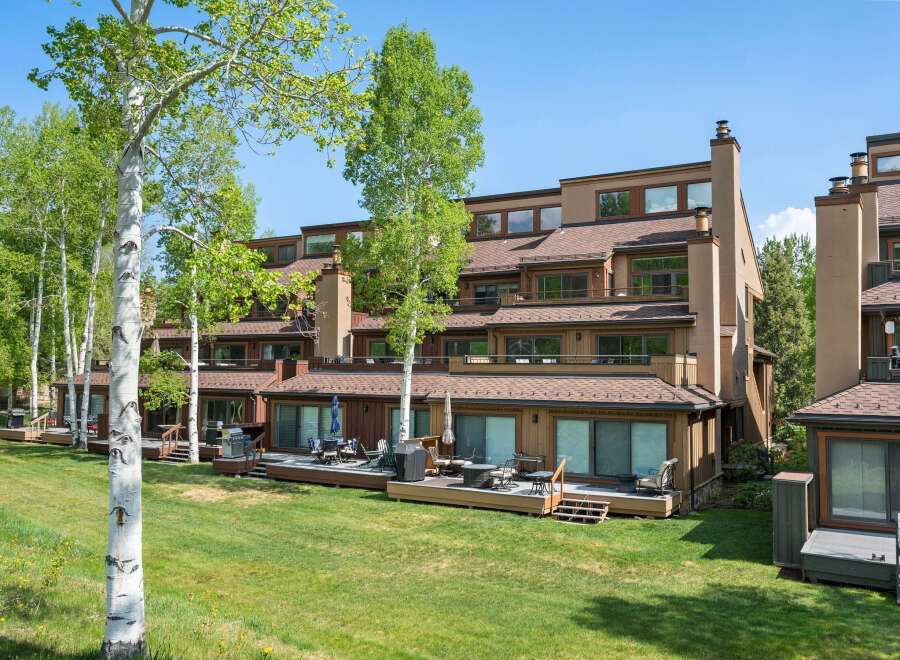Discover this stunning multi-story townhouse with private decks perfect for outdoor living and grilling.
