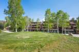 Nestled amongst mature trees, this multi-level property boasts serene views and a connection with nature.