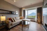 This inviting living room boasts a comfortable sectional sofa, perfect for relaxing and enjoying the stunning mountain views through the expansive window.