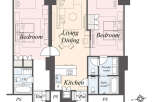 This floor plan showcases a spacious layout with two bedrooms, a combined living and dining area, and a well-equipped kitchen.