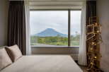 Wake up to breathtaking mountain views from this luxurious property.
