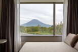 Wake up to breathtaking mountain views from this room.