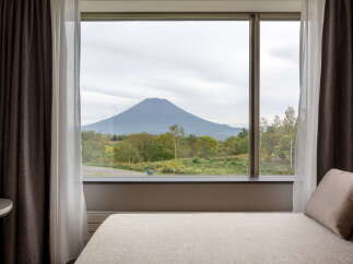 Wake up to breathtaking mountain views from this room.
