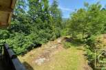 Nestled amongst lush greenery, this property offers a serene escape.
